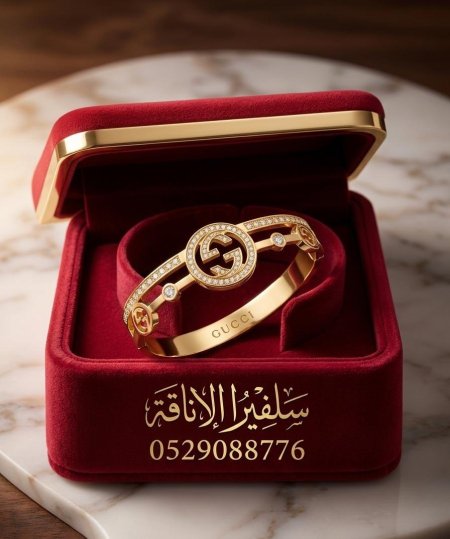 سوارة CUCCI لون ذهبي